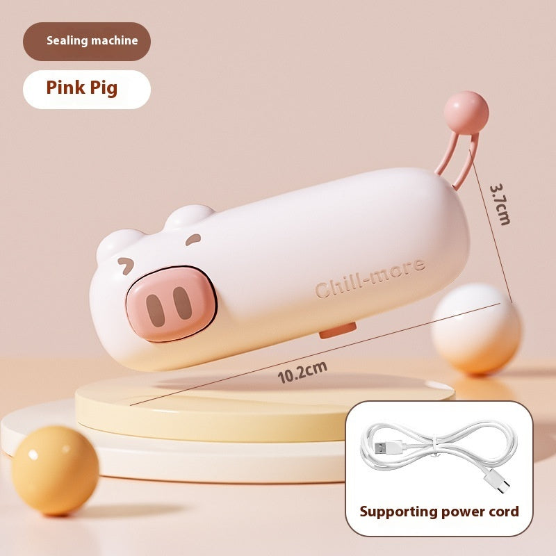 Pink Pig bag sealer and cutter with USB charging cable and dimensions